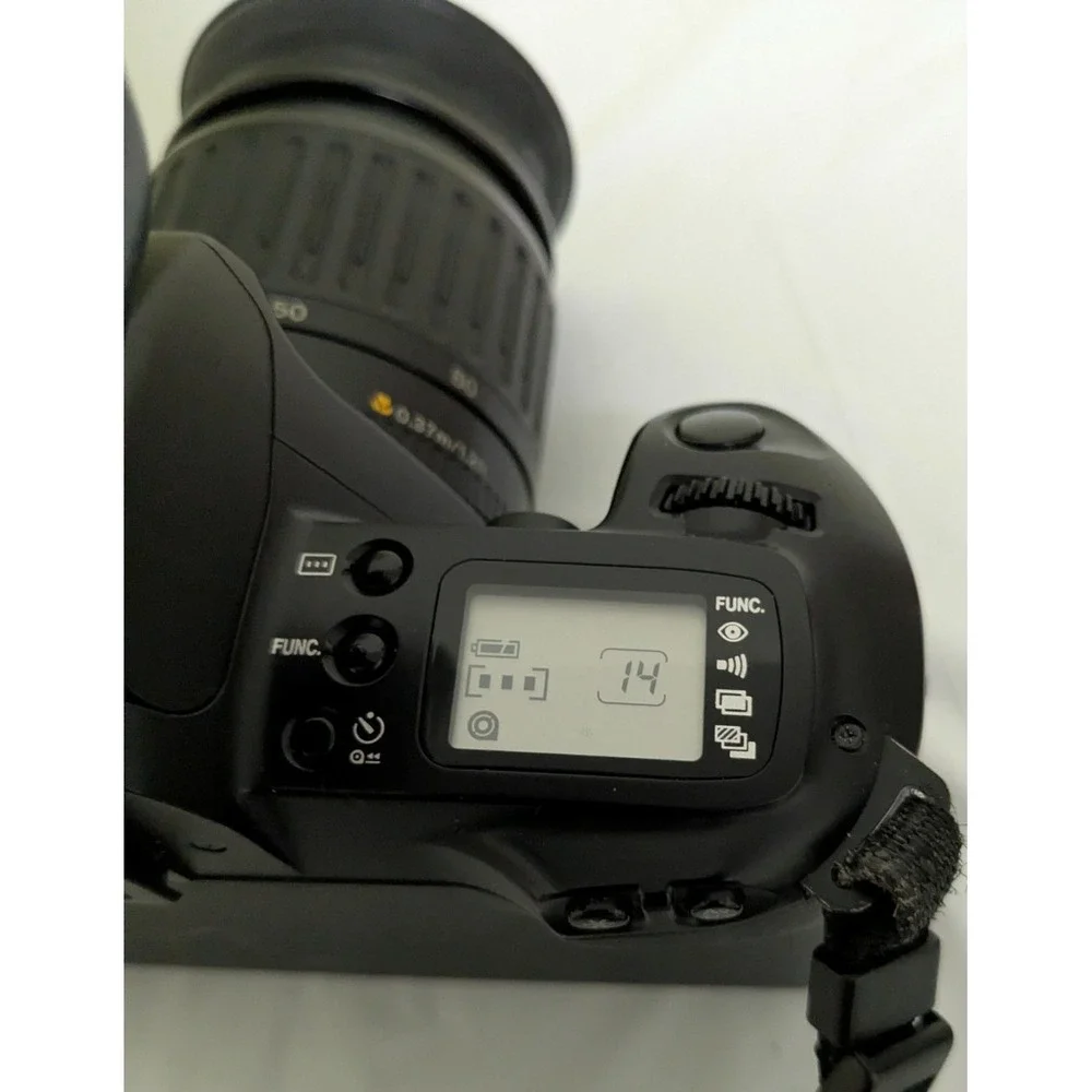 Canon EOS Rebel G 35mm Camera / Canon AF Zoom Lens 35-80mm / Speedlite 200E